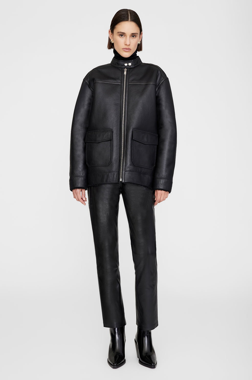 ANINE BING Henry Jacket - Black Leather With Shearling - On Model Front Second Image