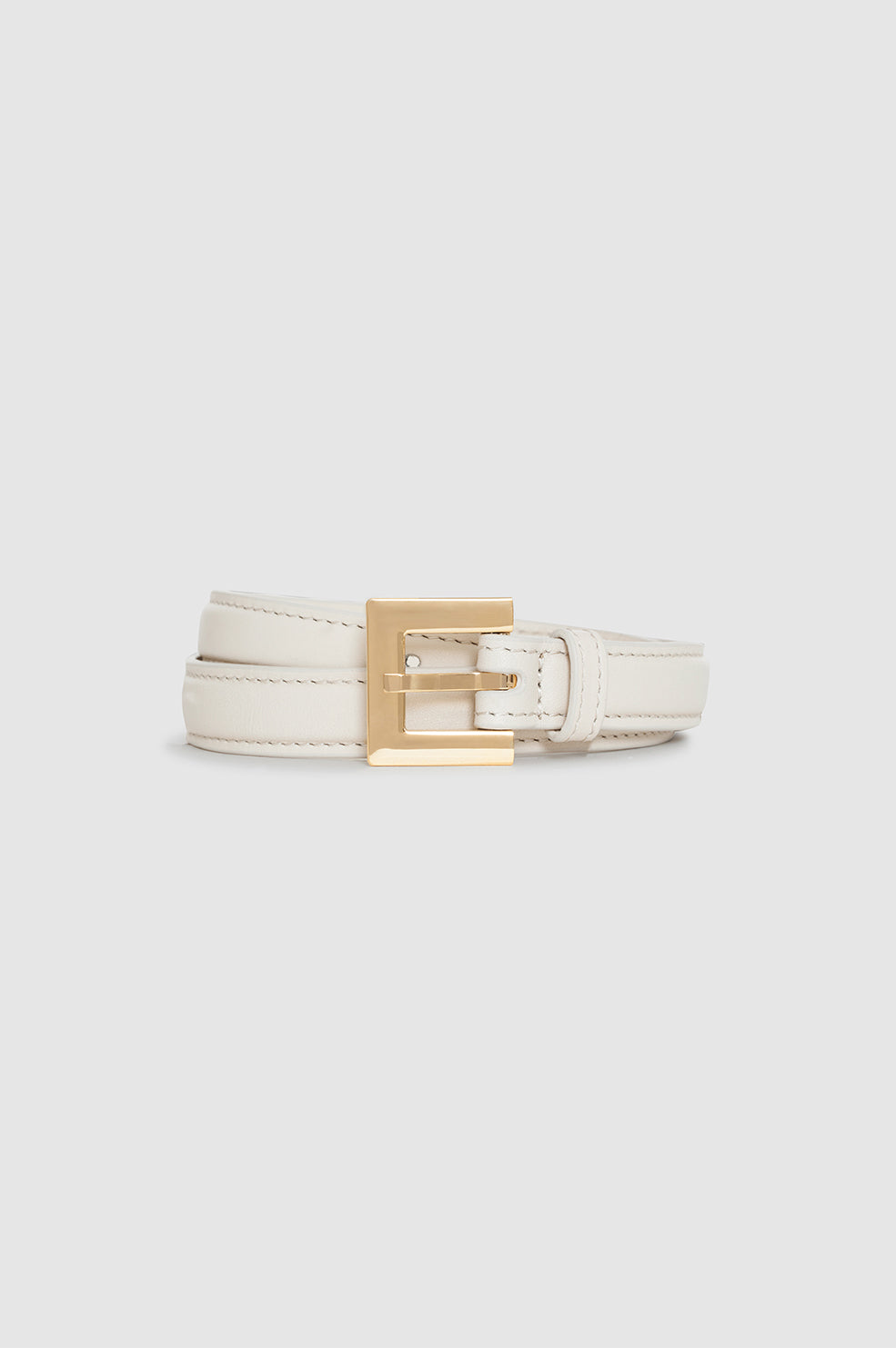 ANINE BING Nicola Belt - Bone With Gold - Rolled Up View